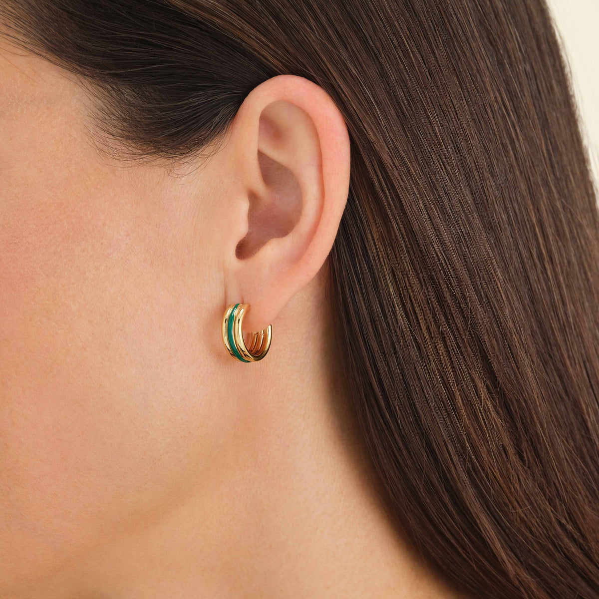 Orecchini Tripli Smeraldo leftcolumn